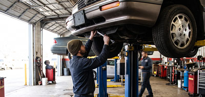 Person getting their car repaired